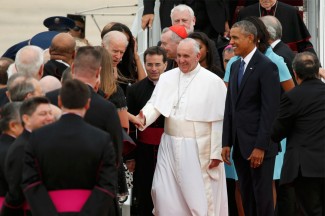 President Barack Obama walks with Pope Francis as the pope greets dignitaries upon his arrival in the United States. (CNS photo/Kevin Lamarque, Reuters)
