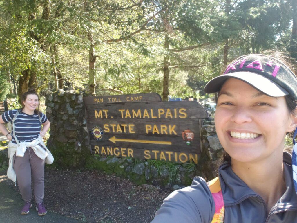 Two female hikers outside of the entrance to Mount Tamalpais State Park