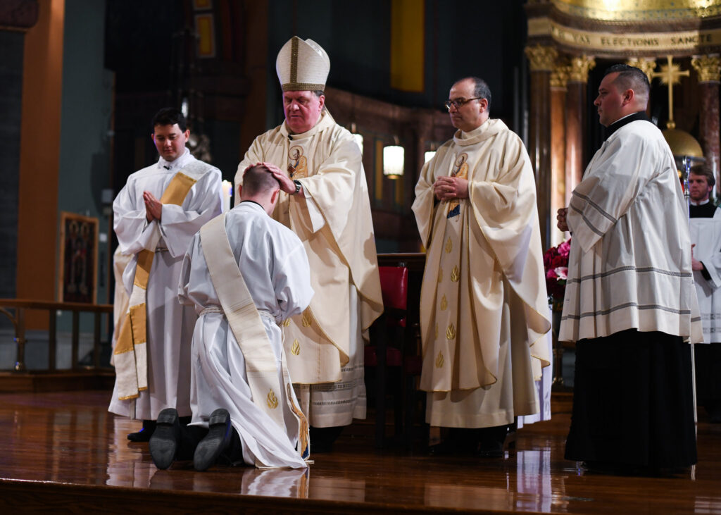 for an article about vocations, Mike Hennessey at his own ordination with the Paulists
